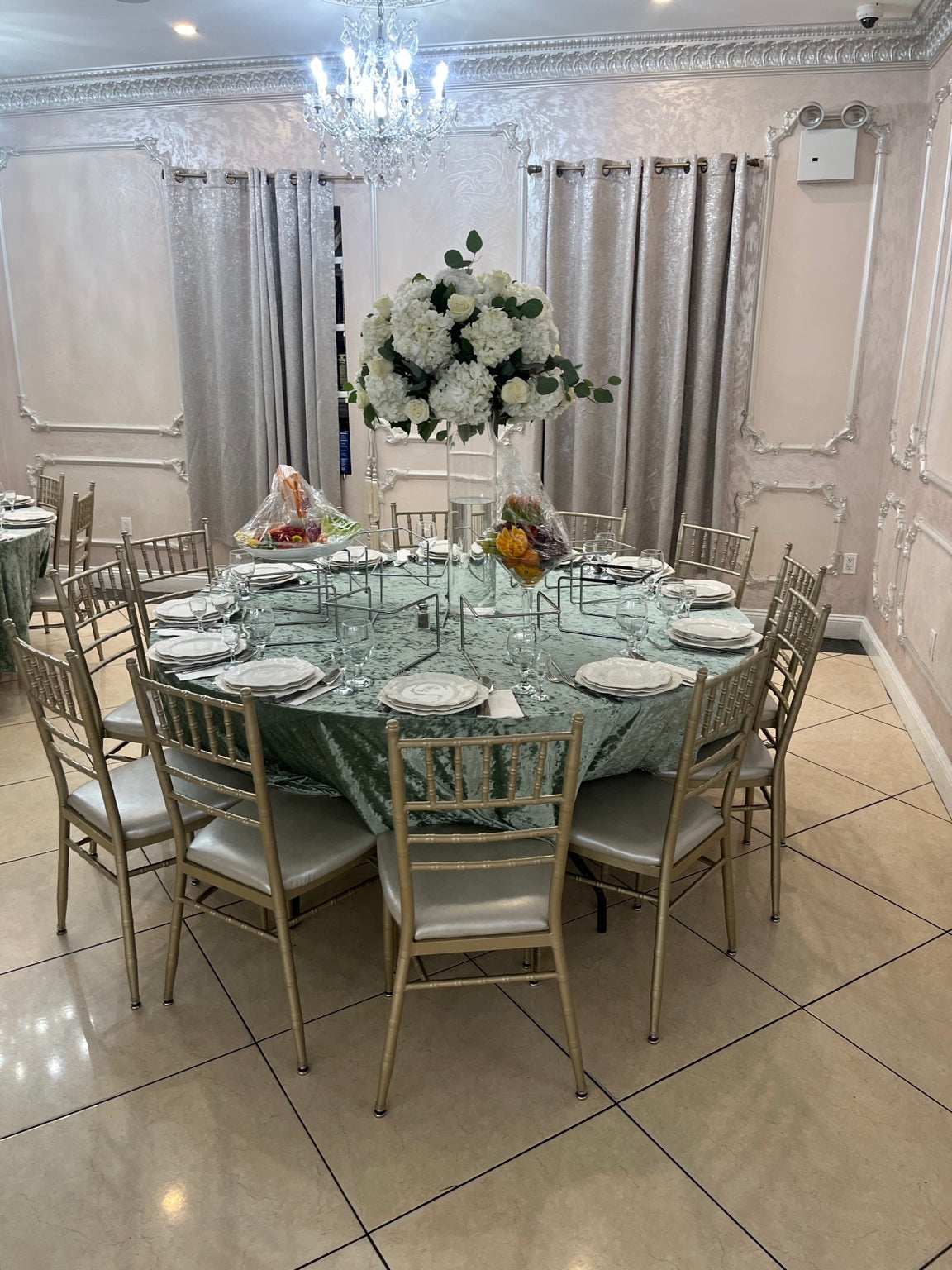 White hydrangea and cream rose Shabbat Hatan centerpiece at Beit Eliyahu Bukharian Jewish Synagogue by Ultimate Creations NY.