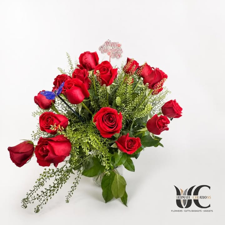 Red rose bouquet with greenery and Valentine’s Day topper