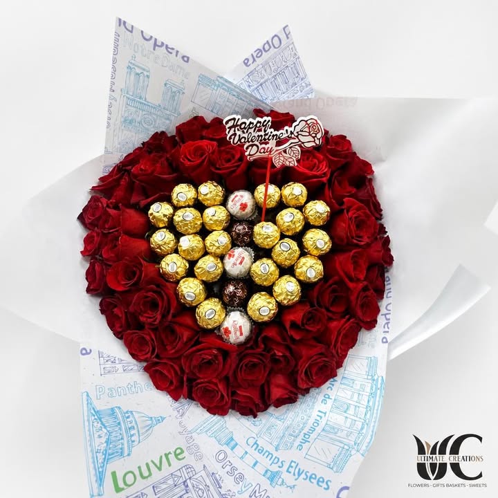 Round red rose bouquet with chocolates and Valentine’s Day topper