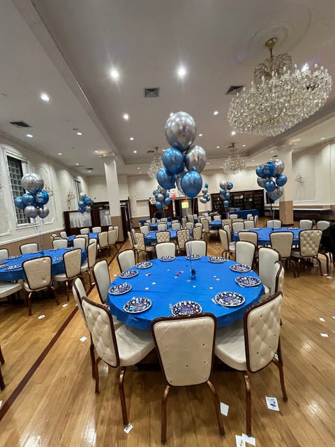 Blue and silver Hanukkah balloon bouquets with weighted centerpieces at BJCC in Forest Hills, Queens, by Ultimate Creations NY.