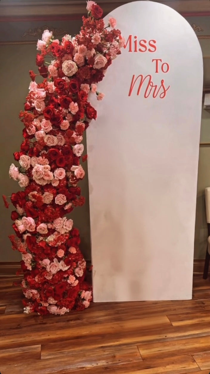 Miss to Mrs bridal shower backdrop with cascading red and blush florals for Orah at Prime Bistro in Cedarhurst