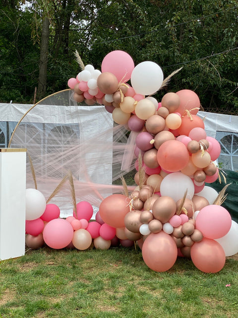 Tamara's Bat Mitzvah balloon backdrop with gold circular frame, pink tulle and rose-gold balloons by Ultimate Creations NY