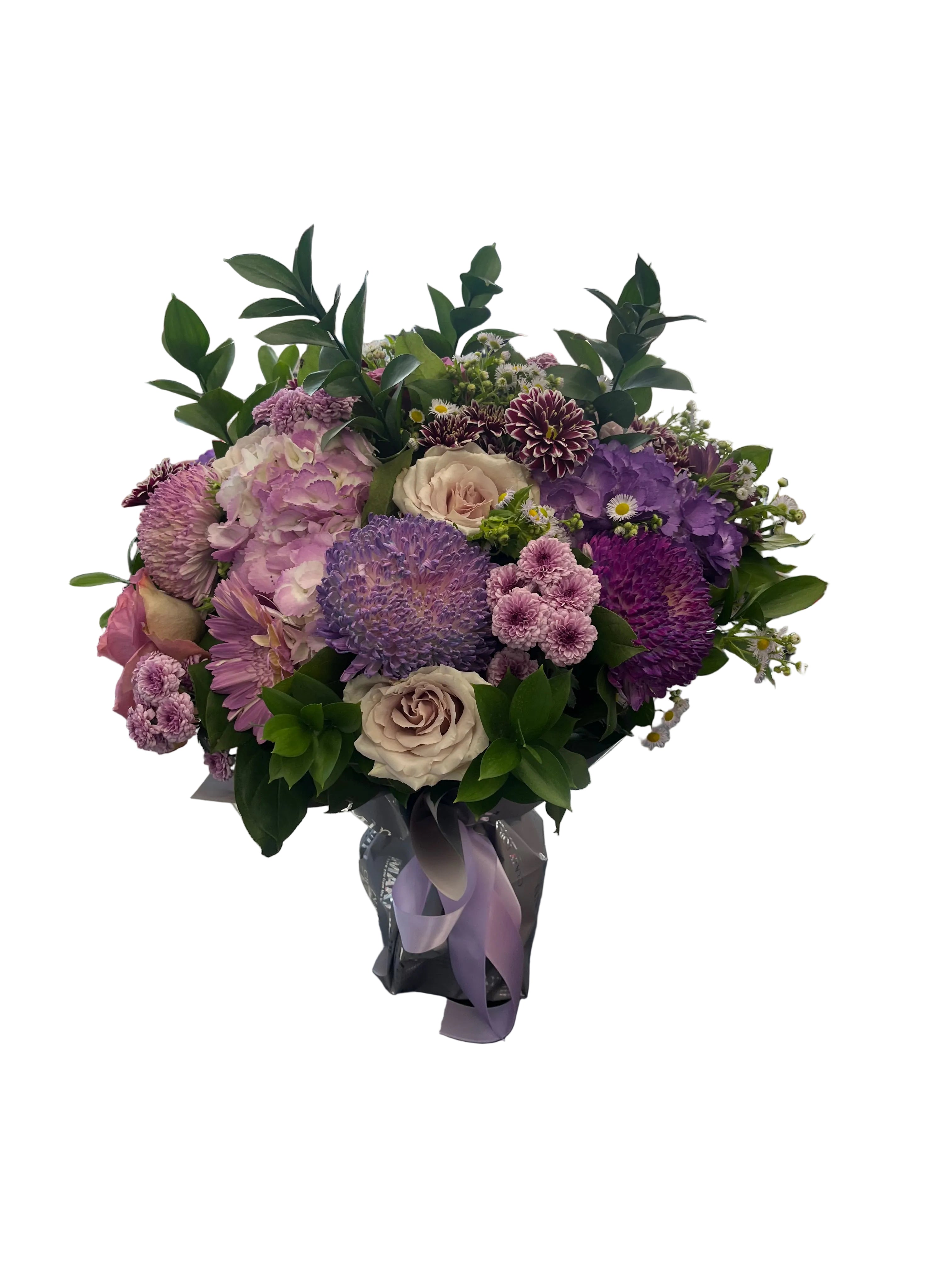 Bouquet of flowers on a counter with a store interior in the background