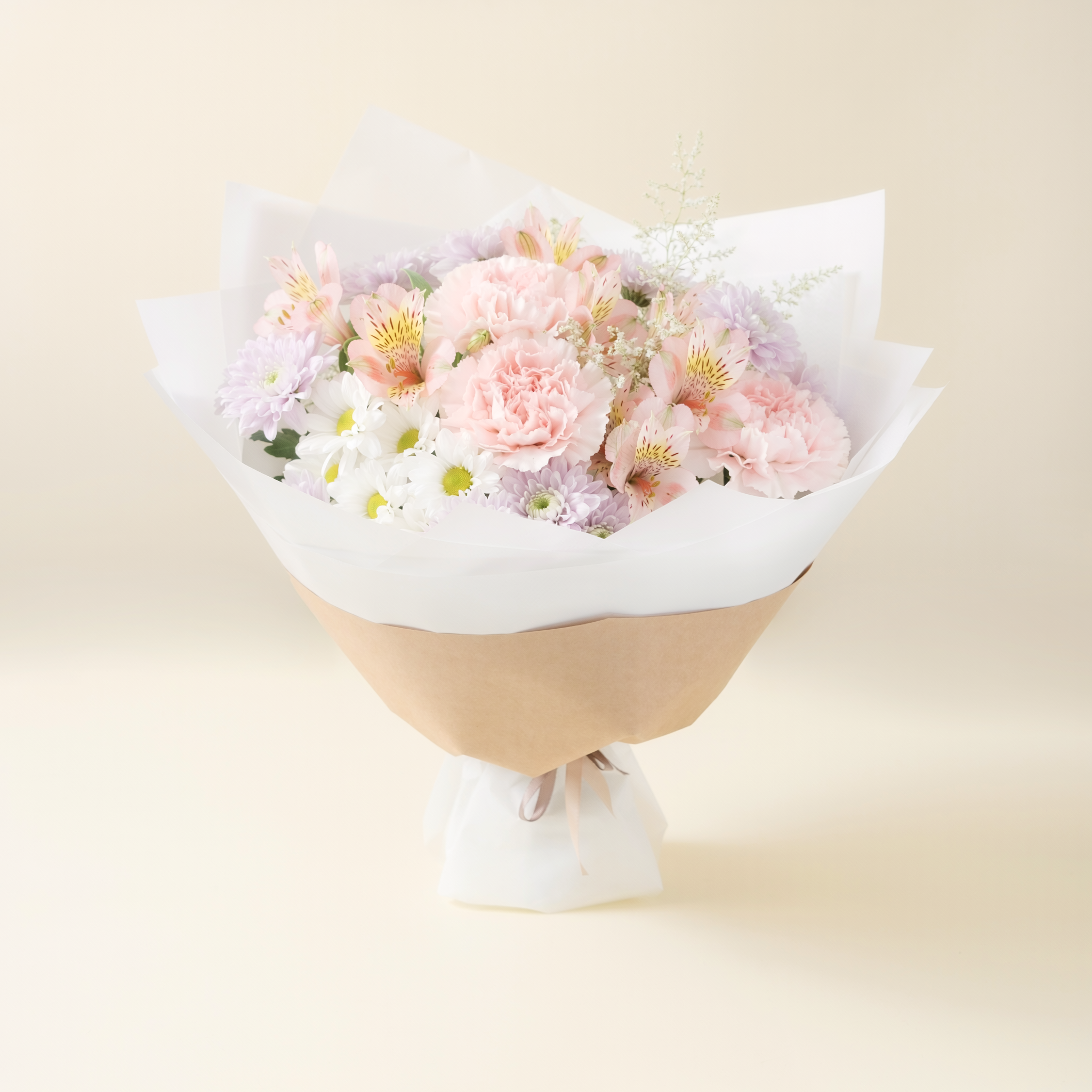 Pastel example of a $25 florist's choice hand-tied seasonal bouquet