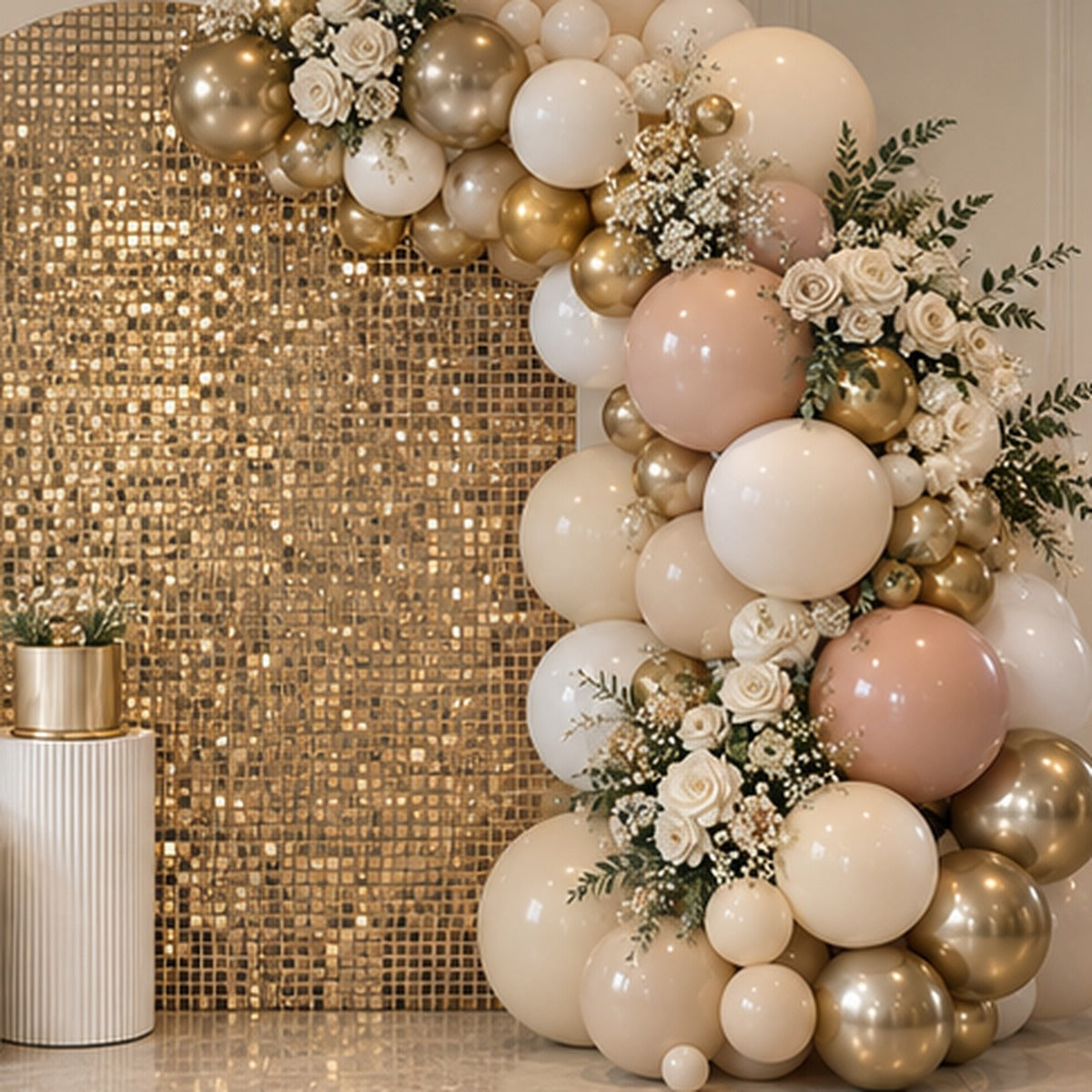 Close view of luxury shimmer wall balloon backdrop with cream blush and gold balloons