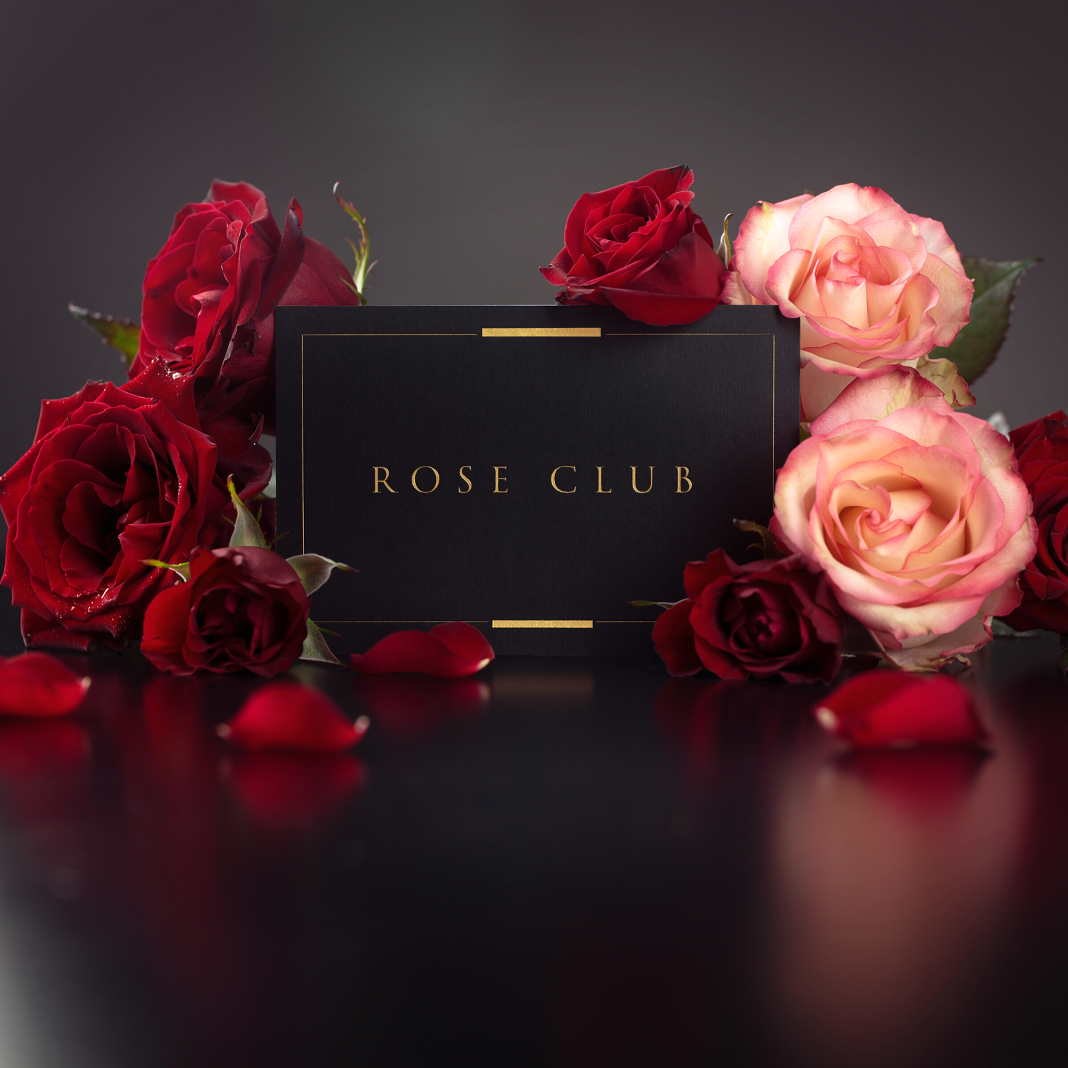Rose Club membership card surrounded by premium red and blush roses