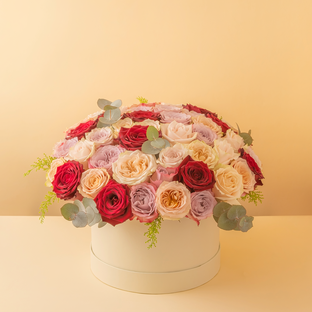 Luxury rose garden flower box with red, blush and ivory roses