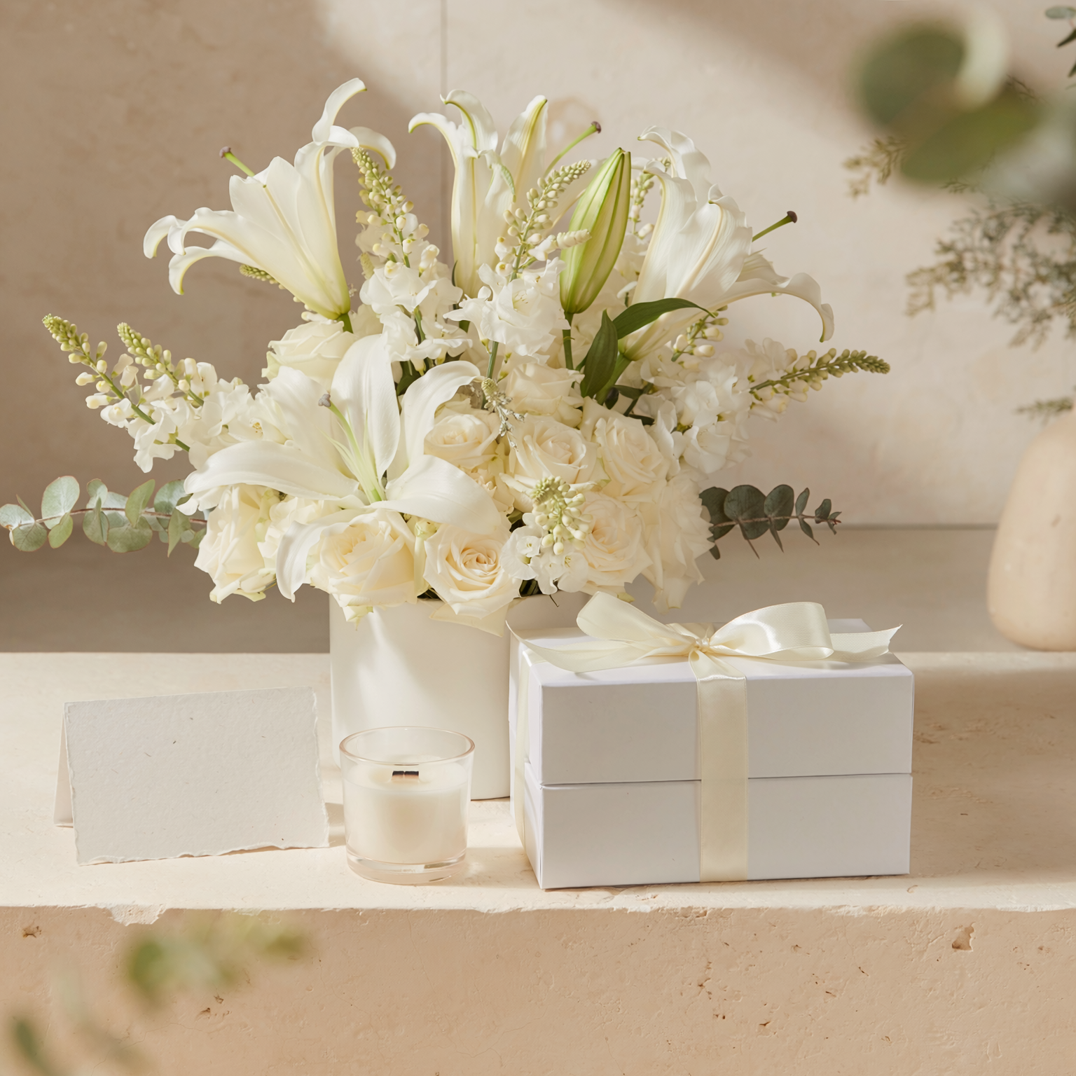 Sympathy Care Membership serene all-white condolence floral arrangement